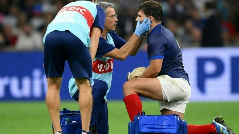 France captain Antoine Dupont had to leave the field after a clash of heads during France's rout of Namibia