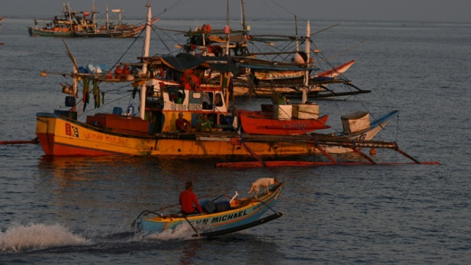 Filipino fishermen say that China's actions at Scarborough Shoal are robbing them of a key source of income 