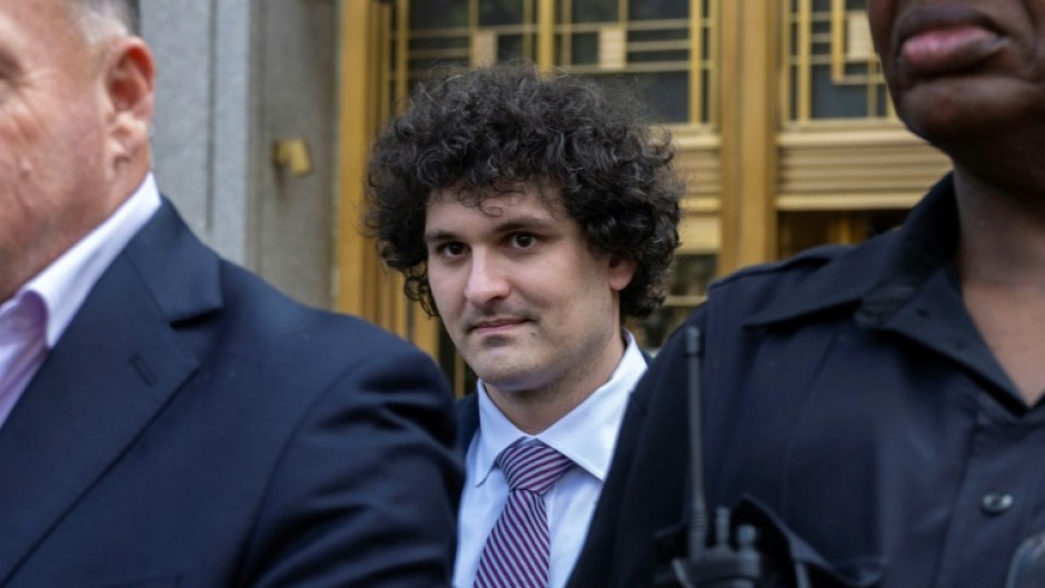 Former FTX chief Sam Bankman-Fried leaves a federal courthouse following a bail hearing ahead of his October trial, in New York