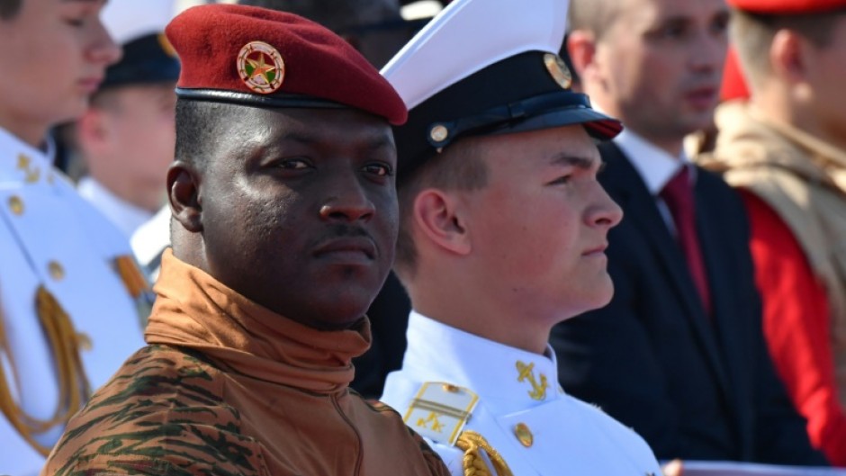 Captain Ibrahim Traore, seen here attending a parade during a visit to Russia in July, became the world's youngest leader when he was sworn in 2022 at the age of 34