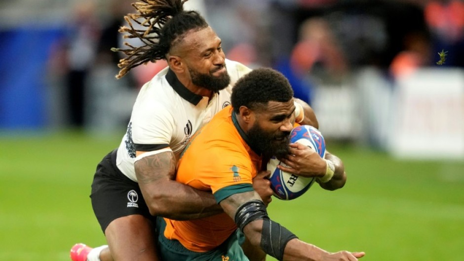 Fiji captain Waisea Nayacalevu tackles 
Australia's Marika Koroibete in Fiji's stunning victory over the Wallabies at the World Cup