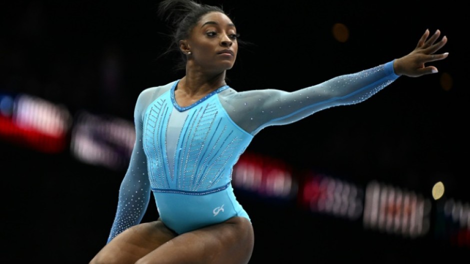 Back on the big stage: Simone Biles competes during the women's qualifying session on Sunday