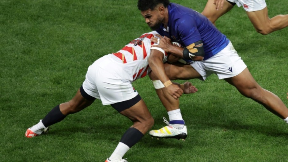 Samoa's Tumua Manu (R) will face compatriot Manu Tuilagi wearing England's colours in the World Cup on Saturday