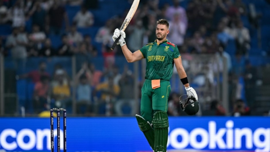 Fast show: South Africa's Aiden Markram celebrates after scoring the fastest ever World Cup century 