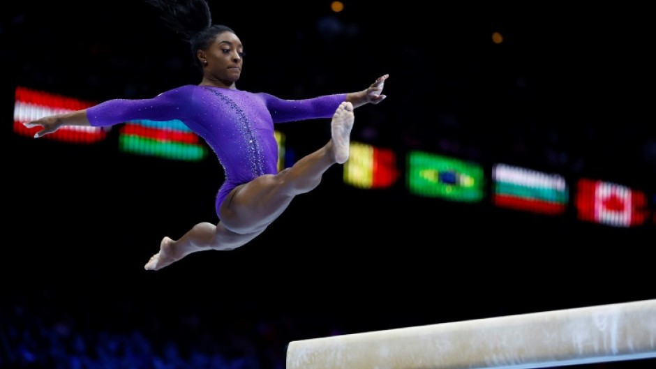 Simone Biles won her 22nd world title and fourth on the balance beam at the world gymnastics championships in Antwerp