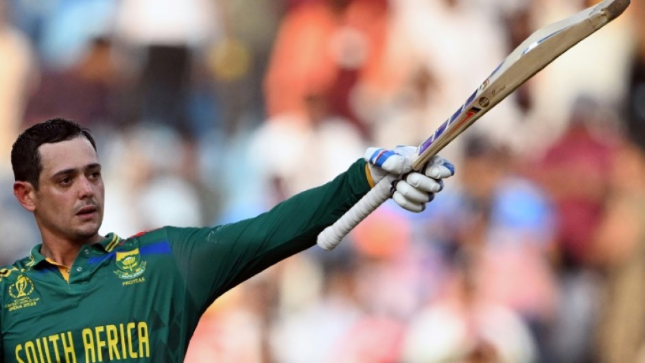 Man of the moment: South Africa's Quinton de Kock celebrates his century against Australia