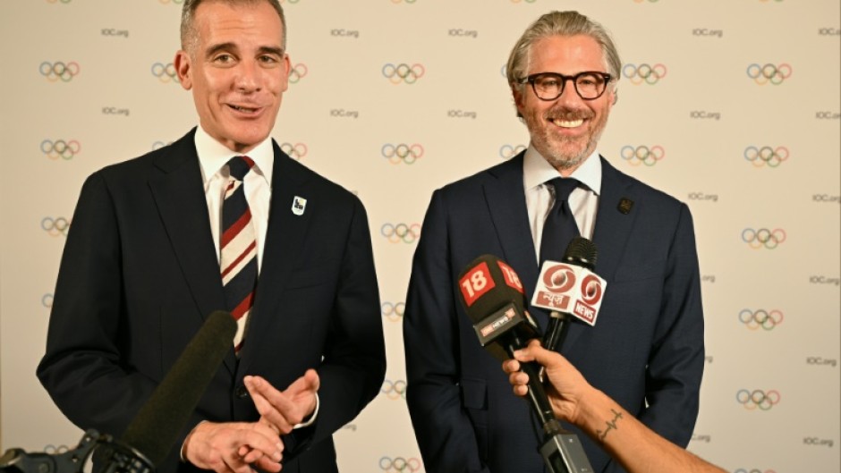 The US ambassador to India Eric Garcetti (left), with chairman of the LA 2028 Olympic Games Casey Wasserman