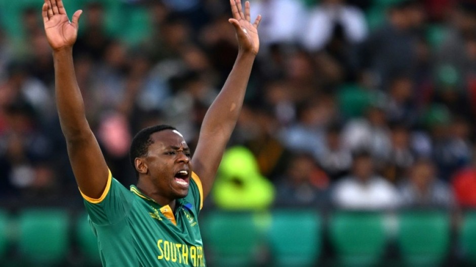 Key breakthrough: South Africa's Kagiso Rabada celebrates after taking the wicket of Bas de Leede 