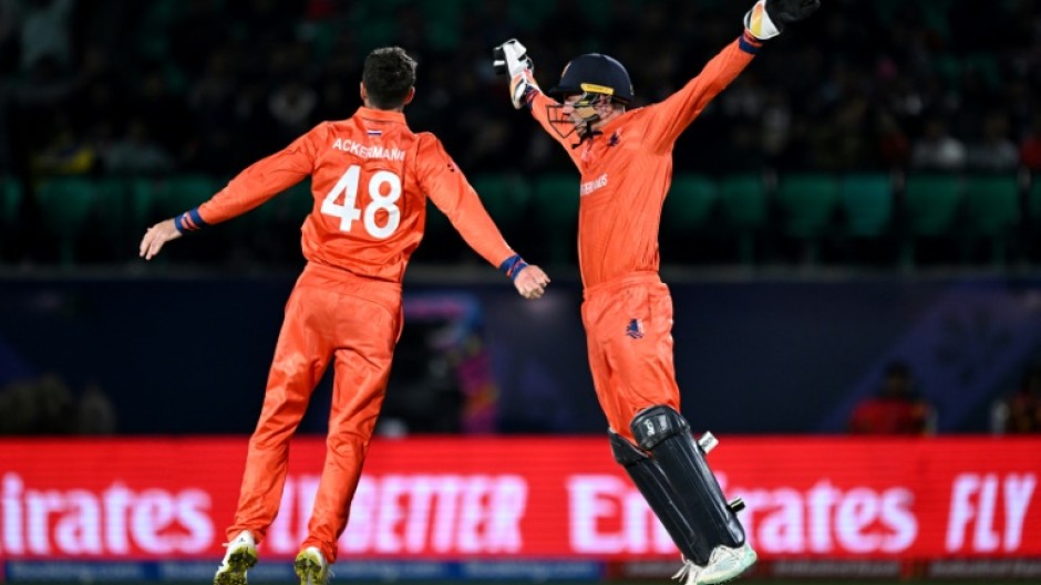 Let's celebrate: Netherlands captain Scott Edwards with Colin Ackermann after taking the catch to dismiss South Africa's Quinton de Kock 