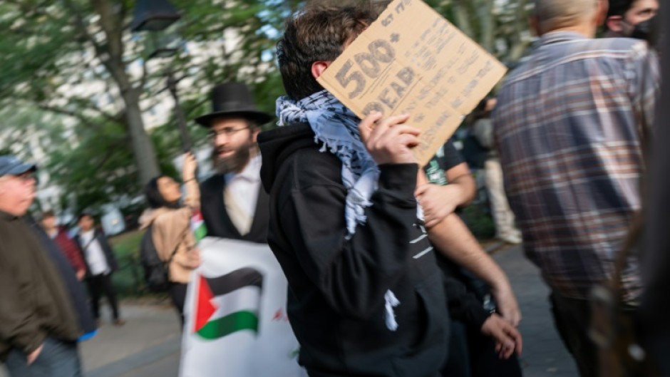 Supporters of both Palestine and Israel face off in dueling protests at Washington Square Park on October 17, 2023 in New York City