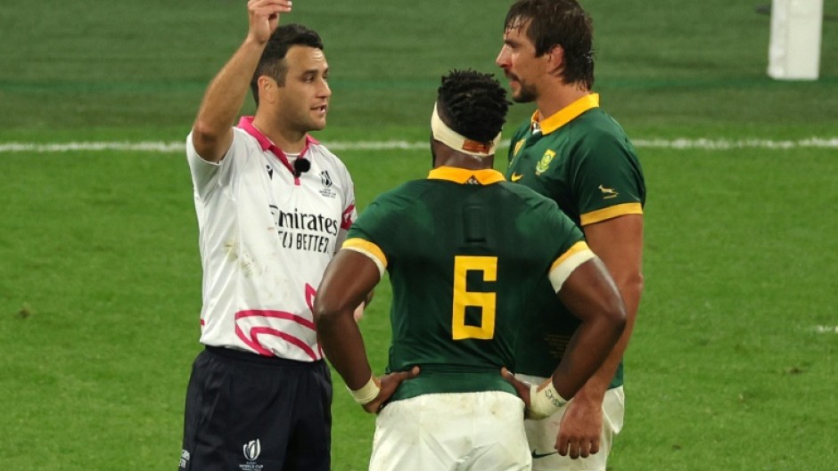 South Africa lock Eben Etzebeth (R) is shown a yellow card by Ben O’Keeffe (L) during the thrilling win over France