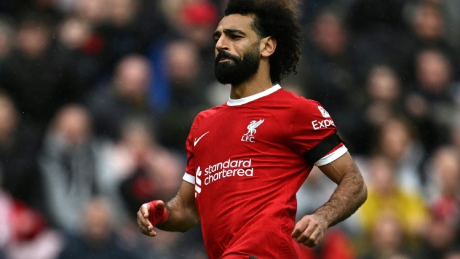 Mohamed Salah reacts after scoring his second goal for Liverpool in a Merseyside derby victory over Everton
