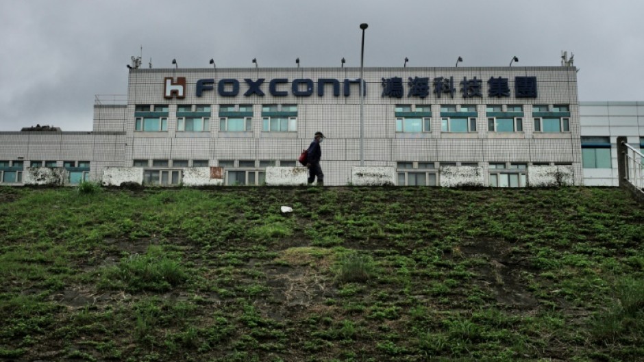 Taiwan defended tech giant Foxconn after China launched an investigation into several of the firm's sites