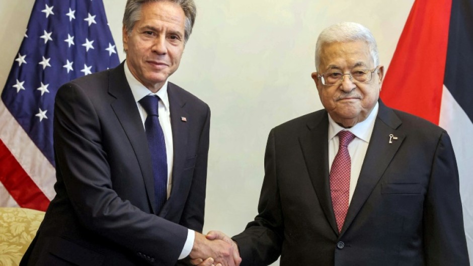 Palestinian president Mahmud Abbas (R) meets with US Secretary of State Antony Blinken in Amman