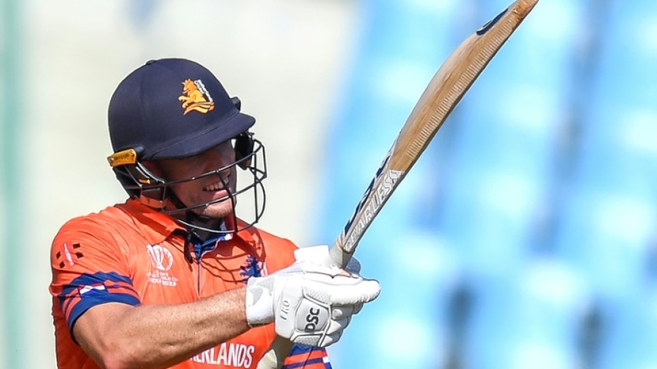 In the runs: Logan van Beek celebrates after scoring a half-century in the game against Sri Lanka in Lucknow 