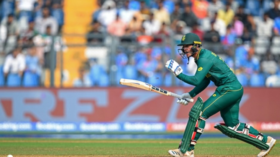 Century-maker: South Africa's Quinton de Kock plays a shot in Tuesday's game against Bangladesh at the Wankhede Stadium in Mumbai 