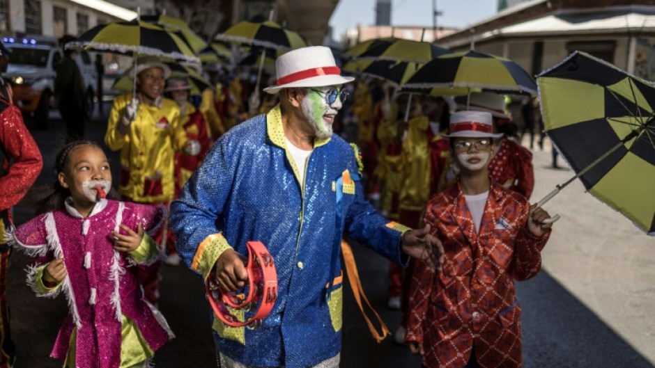 Minstrels and baton-twirling majorettes were fixtures of the Johannesburg parade