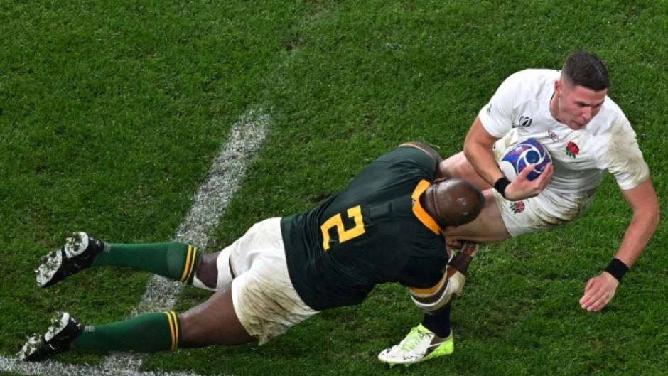 Bongi Mbonambi (L) may have been taught by his white school friends to play rugby but he also learned how to party with them too