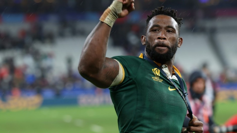 South Africa captain Siya Kolisi celebrates his side's victory in the Rugby World Cup final over New Zealand