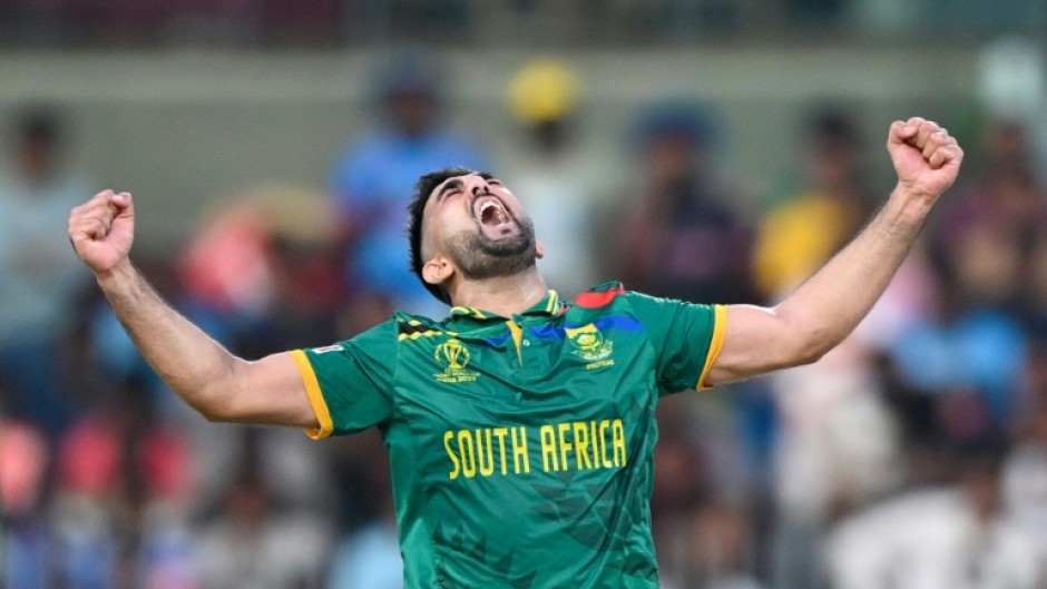 Tailend stars: South Africa's Tabraiz Shamsi (left) and Keshav Maharaj celebrate the one-wicket win