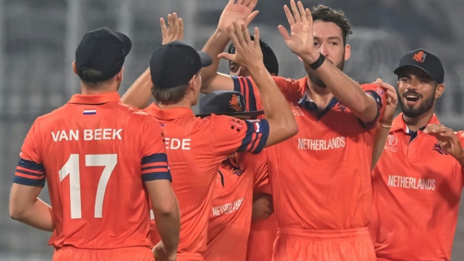 Taming the Tigers: Netherlands' Paul van Meekeren (2R) celebrates after dismissing Bangladesh's Mushfiqur Rahim in Kolkata