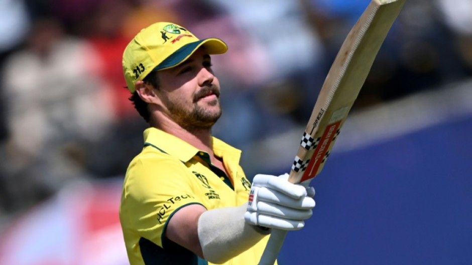 Head of the class: Australia's Travis Head celebrates after scoring his century on Saturday