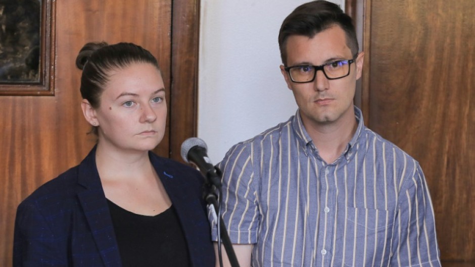 Nicholas and Mackenzie Spencer were arrested last year and initially charged with "aggravated trafficking" and committing "aggravated torture"