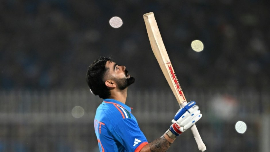 Moment of glory: Virat Kohli celebrates after scoring his 49th ODI century on Sunday 