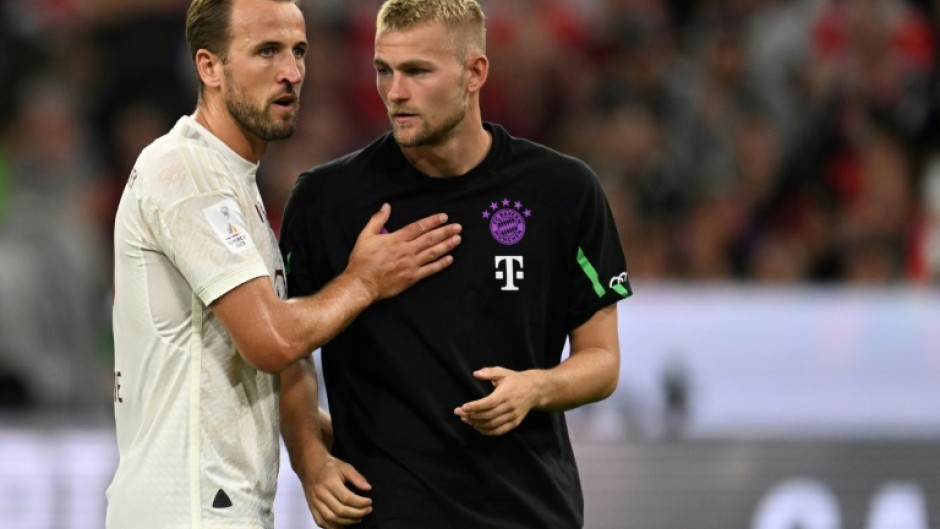 Bayern Munich forward Harry Kane (L) and defender Matthijs de Ligt. De Ligt will miss several weeks with a knee injury. 