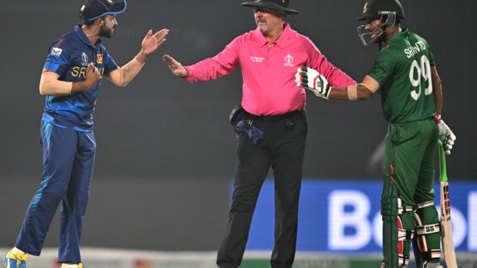 Flashpoint: Sri Lanka's Sadeera Samarawickrama (left) and Bangladesh's Najmul Hossain Shanto have to be separated by the umpire in Monday's tense clash