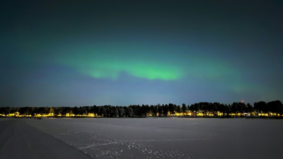 The Northern lights illuminating the sky over Lulea this year. The Swedish town sits just 150 kilometres south of the Arctic Circle. 'Here it's the opposite of Spain, where you are outside a lot,' said social strategist Asa Koski 