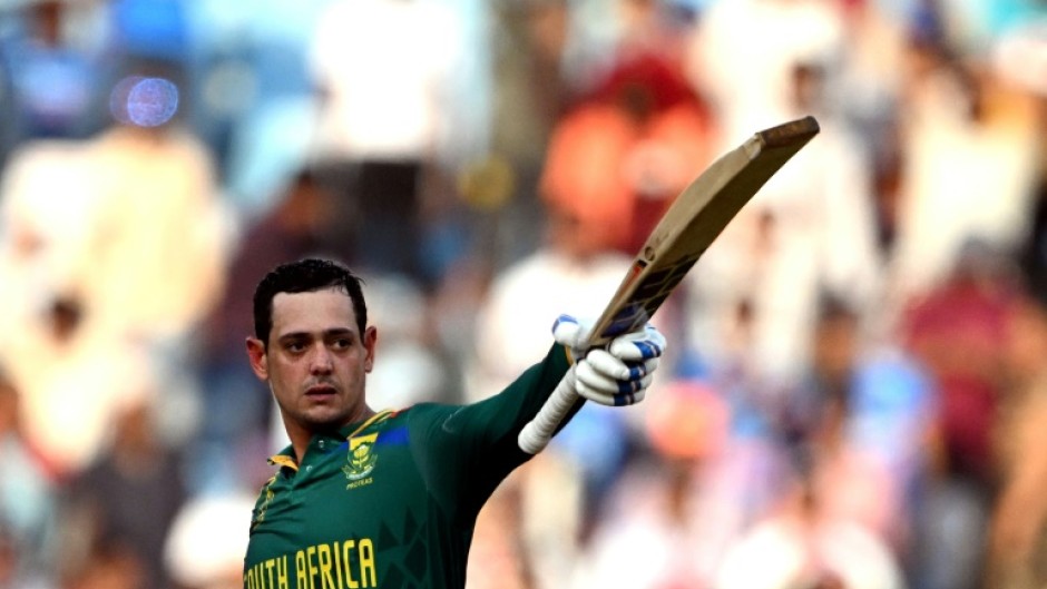 Dangerman: South Africa's Quinton de Kock celebrates after scoring a century against Australia in the group stage win in Lucknow