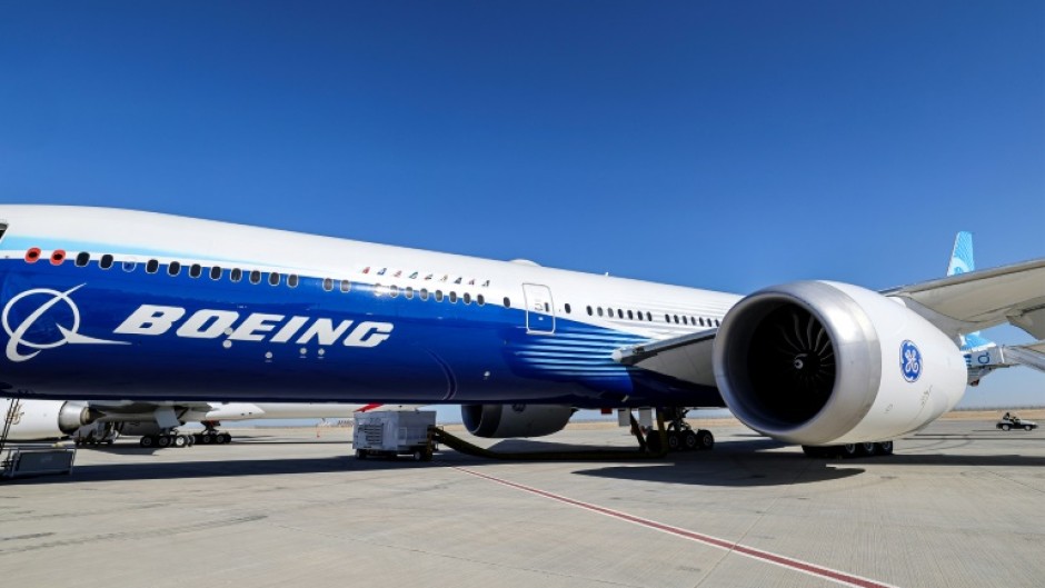 A Boeing 777-9 airliner on the tarmac during the 2023 Dubai Airshow, where Emirates ordered 55 of the planes 