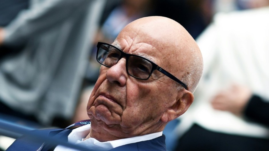 Media mogul Rupert Murdoch is ceding control of his empire to son Lachlan