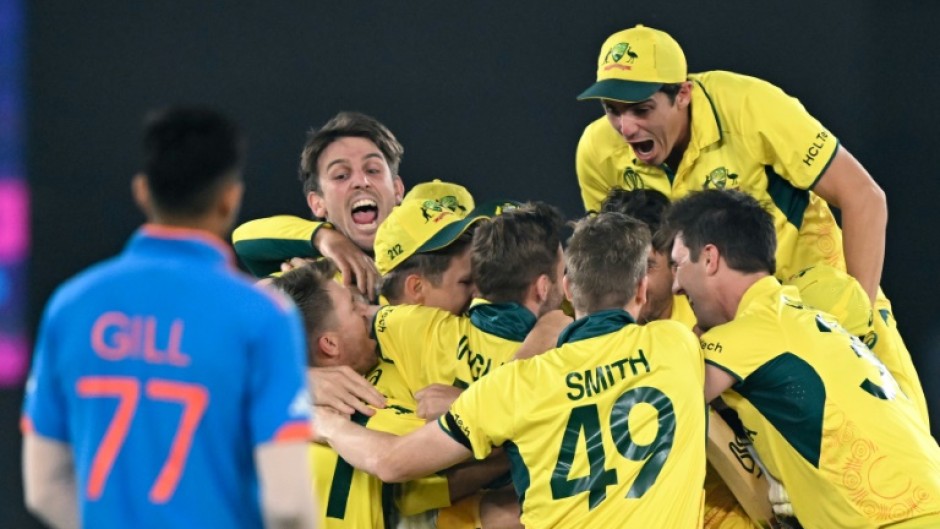 Champions: Australia's players celebrate after winning the title