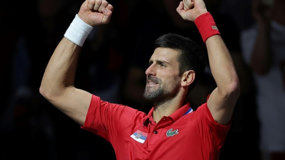 Serbia's Novak Djokovic celebrates beating Britain's Cameron Norrie to send his country into the semi-finals on Thursday