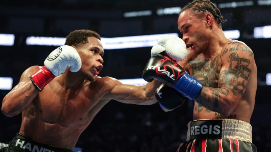 Devin Haney punches Regis Prograis on the way to a unanimous decision victory to take Prograis's  WBC super-lightweight world title