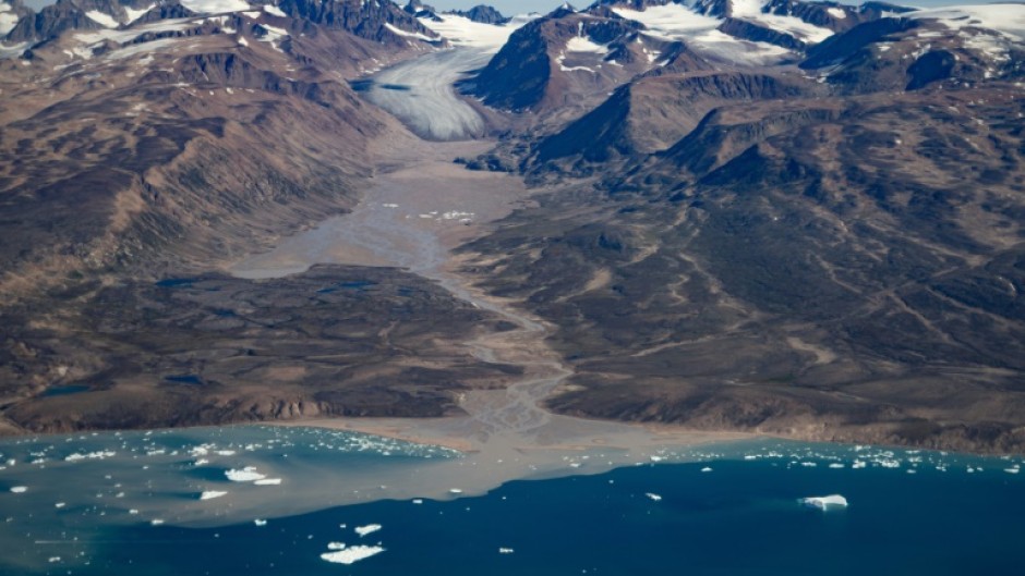 This aerial photograph taken on August 11, 2023, shows a glacier around "Constable Point" severely melted due to warm temperatures along the Scoresby Sound Fjord, in Eastern Greenland