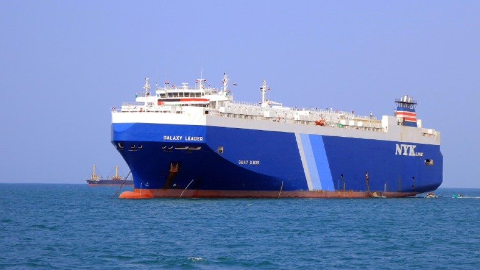 A picture taken during an organised tour by Yemen's Huthi rebels on November 22, 2023 shows the Galaxy Leader cargo ship, which the rebels seized, off Hodeida