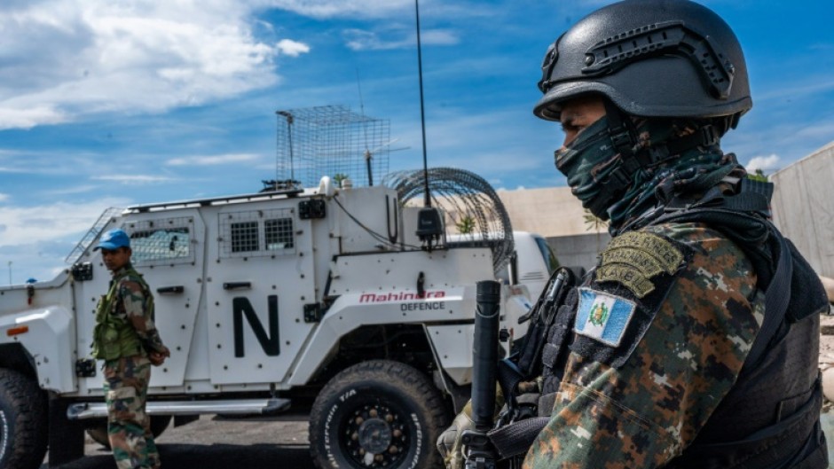 A Monusco peacekeeper looks on at the force's base during a field training exercise in Sake, eastern Democratic Republic of Congo in November 2023