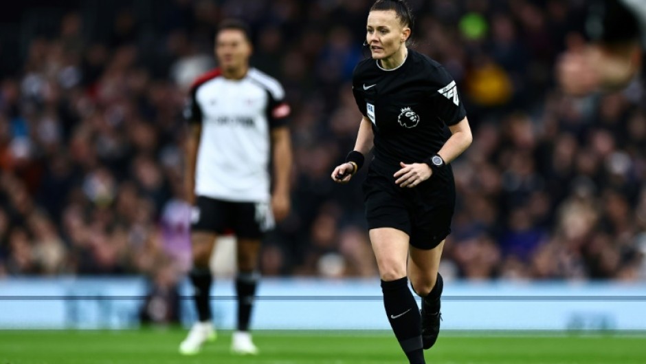 Landmark achievement: Rebecca Welch takes charge of the match between Fulham and Burnley as she becomes the first female referee of an English Premier League football fixture 