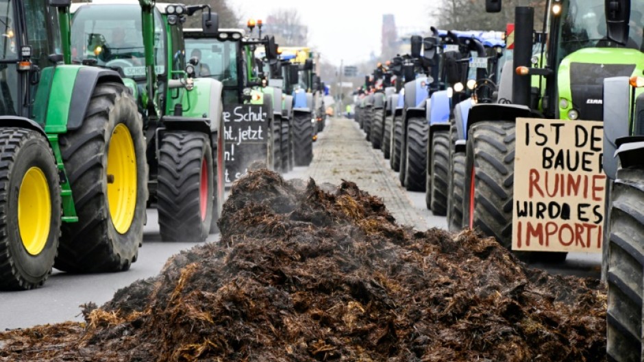 Farmers blocked a main road into central Berlin and dumped manure on the street in December after plans to end fuel and registration tax cuts 