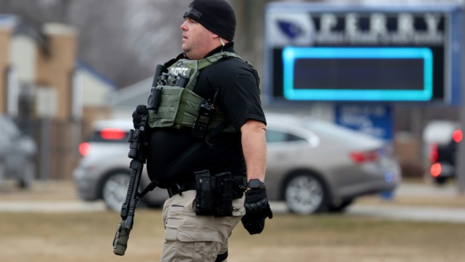 Police respond to a school shooting in Perry, Iowa