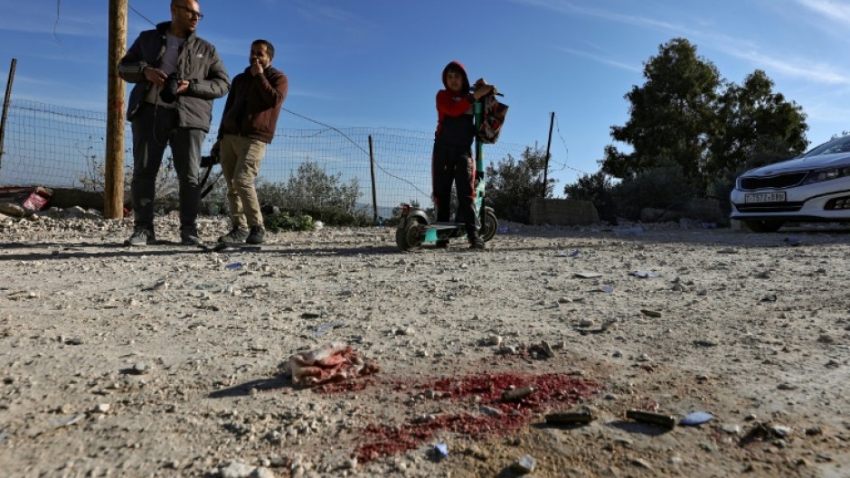 Blood stains remain near the spot where an explosive device killed an Israeli officer during an Israeli raid in Jenin, the occupied West Bank 