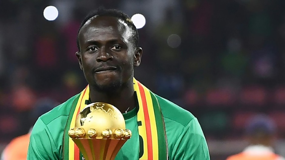 Senegal star Sadio Mane with the Africa Cup of Nations trophy after winning the 2022 final against Egypt