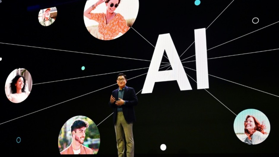 Samsung Electronics CEO JH Han highlights AI developments at a CES press event in Las Vegas