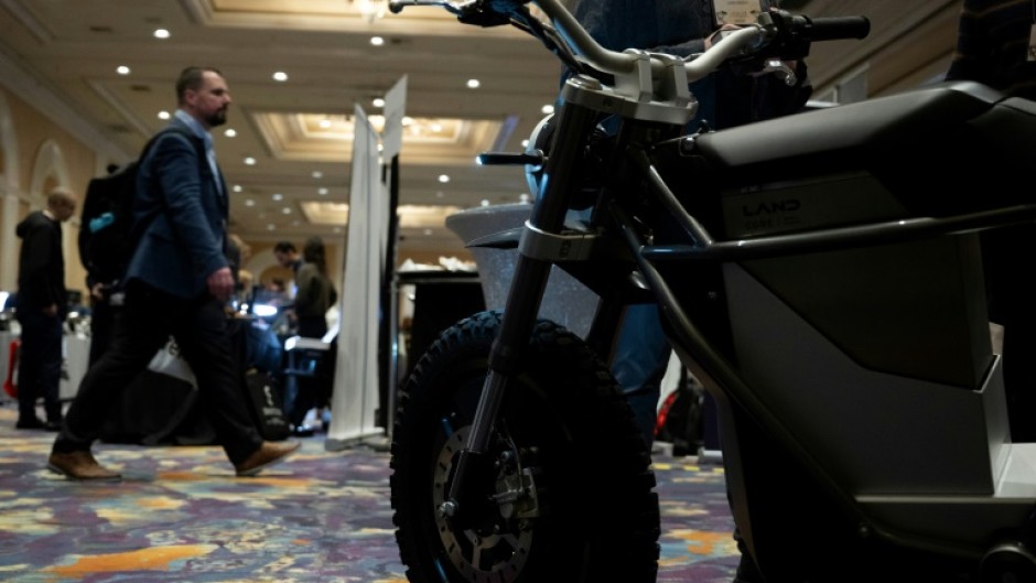 A man walks past an e-bike  at the The Mirage resort during the Consumer Electronics Show (CES) in Las Vegas