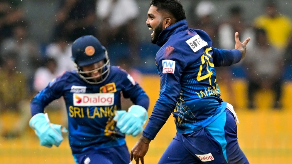 Leg-spinner Wanindu Hasaranga (R) took 7-19 as Sri Lanka skittled Zimbabwe for 96 in the third and final OCI against Zimbabwe in Colombo