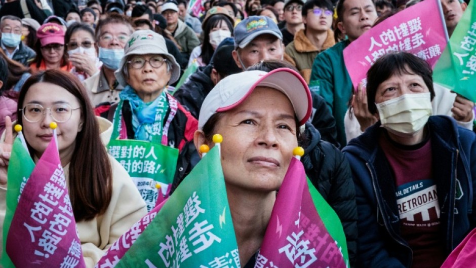 Supporters of the ruling Democratic Progressive Party (DPP) wait for the vote counting in Taiwan's election