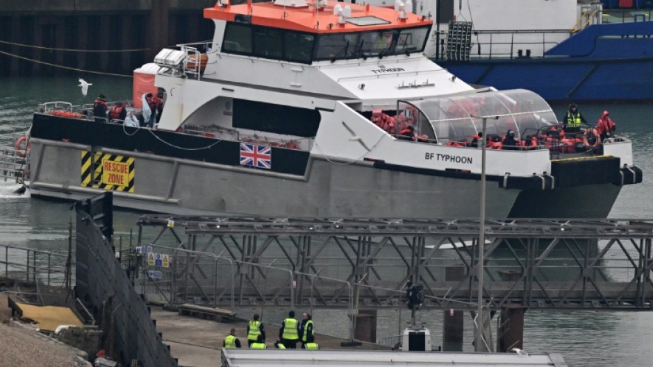 Migrants are picked up by UK Border Force patrols in the Channel and brought ashore